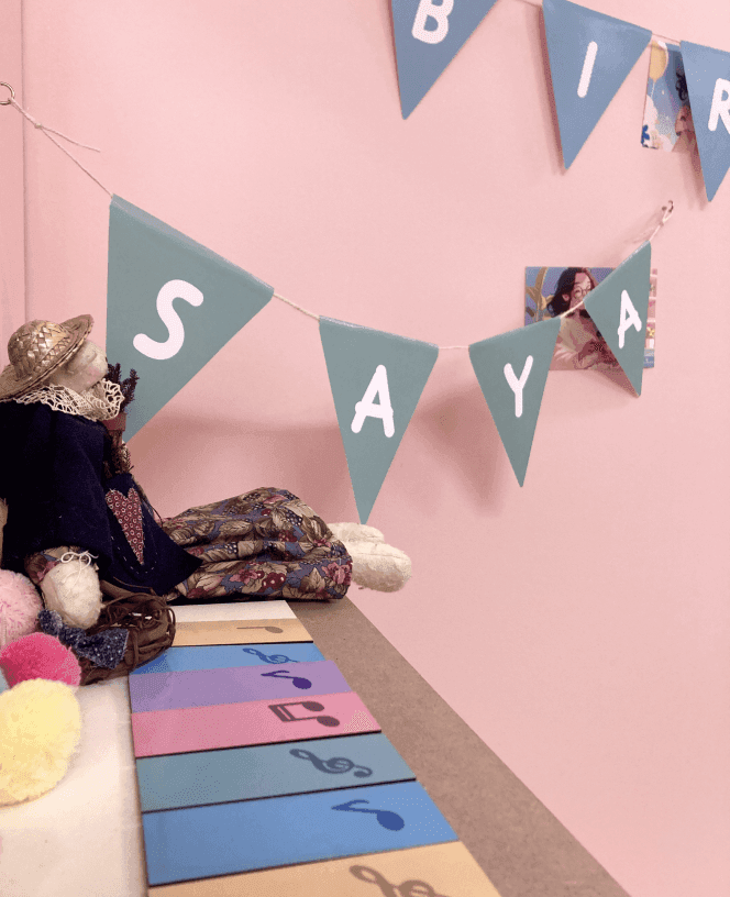 Saya banner and playroom detail